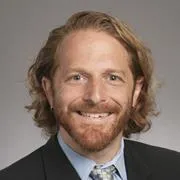 Dr Mile Davis